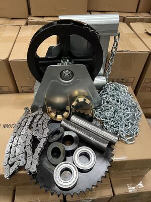 Dispositif de fermeture de volet roulant     Treuil à chaîne pour porte roulante à fonctionnement simplifié avec engrenage à chaîne pratique